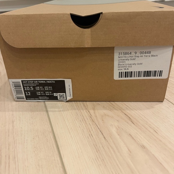 Nike NOCTA Hot Step Air Terra - Black and University Gold - Picture 1 of 10